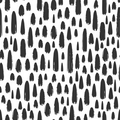 Black ink different small strokes isolated on white background. Monochrome seamless pattern. Vector simple flat graphic hand drawn illustration. Texture.