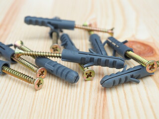 Screws with plastic dowels. Construction and repair works. Building supplies store