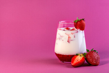 Strawberry milk in a glass.