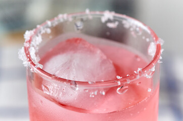 A glass of pink punch