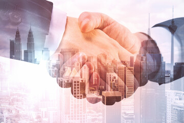 Plakat Hand shake on creative city background. Businessmen and women working together. Success and cooperation concept. Double exposure.