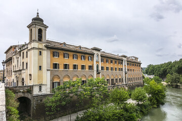 Fototapeta premium Beautiful cityscape along River Tiber in the Rome historic center. Rome, Italy.