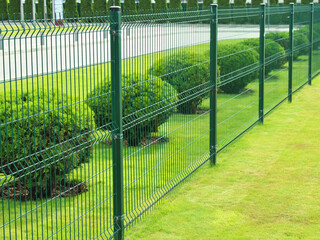 neat fence around a private area outside the city