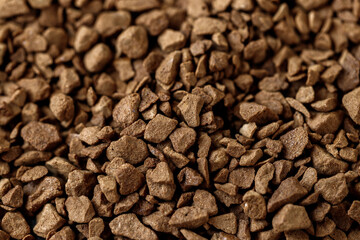 Instant granular coffee macro photo, many small granules