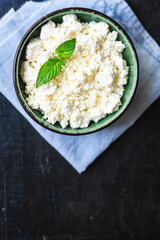 cottage cheese goat or sheep milk on the table healthy food meal copy space food background rustic top view keto or paleo diet