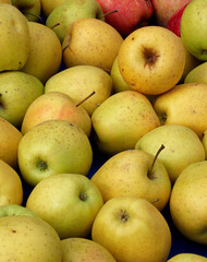 organic and fresh apples in a market
