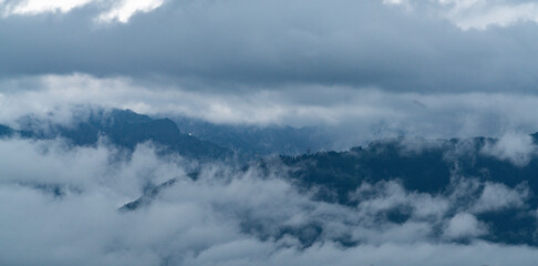 Fototapeta premium clouds over the mountains