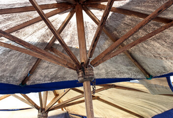 old fabric umbrellas in the market