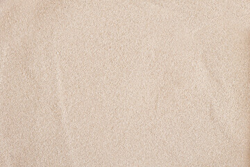 Fototapeta na wymiar sand background, texture of light sand top view