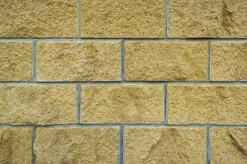 A wall of large brick for a background paint.