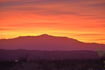Headlights along California I-10 at Desert Sunset