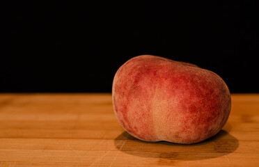 Peaches infront of black