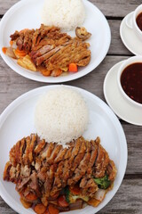 Chinesische Ente mit Gem&uuml;se und Reis.