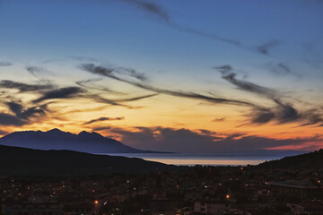 Gokceada city center, sea view and Samothrace island at sunset . At dawn between the sea and the mountains. Gokceada, Imbros, Canakkake Turkey