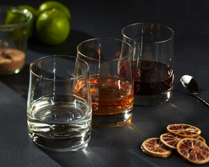 Set of strong alcoholic drinks in rocks glasses