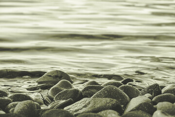 black and white sea, reflection of sea waves and cliffs