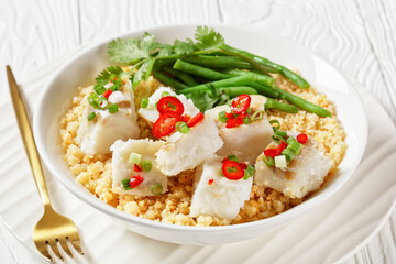 cod with bulgur, steamed green beans, top view