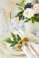 Festive Christmas table setting with flowers