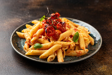 Baked sweet cherry tomatoes and Greek feta cheese fussily pasta. Trendy Vegetarian food