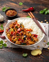 Kung Pao Chicken with Peppers, zucchini and rice. Asian take away food