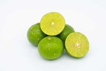 Fresh green lemon isolated on white background.