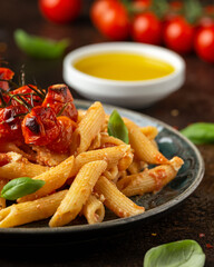 Baked sweet cherry tomatoes and Greek feta cheese fussily pasta. Trendy Vegetarian food