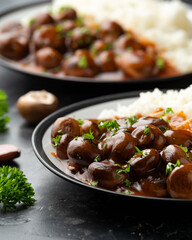 Mushrooms in Balsamic Soy rich sauce with rice. healthy vegan food.