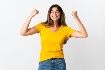 Young caucasian woman isolated on white background doing strong gesture