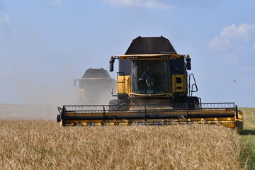 Fototapeta na wymiar combine harvester working on a field