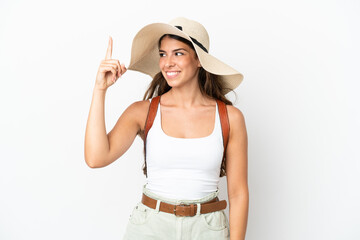 Young caucasian woman wearing a Pamela in summer holidays isolated on white background intending to realizes the solution while lifting a finger up