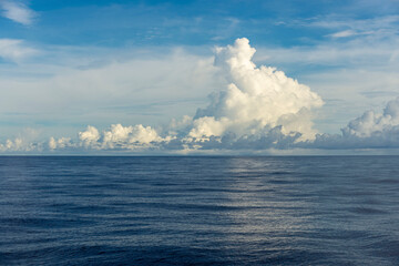 Beautiful seascape - waves and sky with clouds with beautiful lighting. Golden hour.
