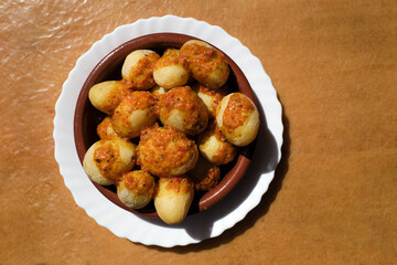 dish with papas arrugadas and mojo, typical food from the Canary Islands