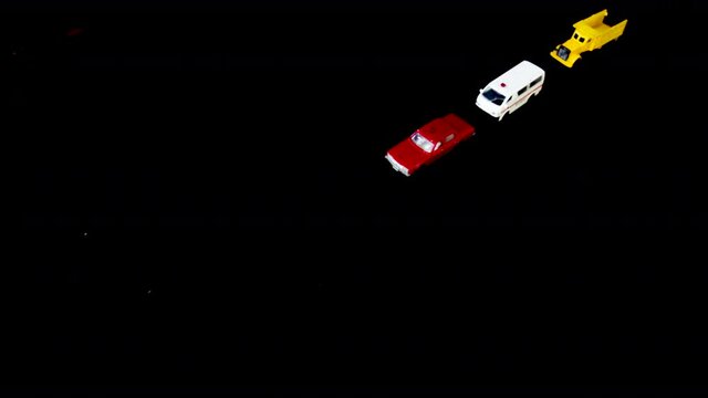 Stop motion photo ,Police vehicles, fire engines and ambulances are mobile.black ,black background