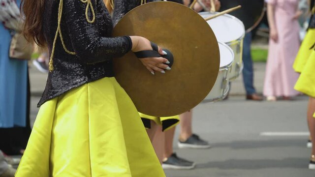 Young girls drummer at the parade. Street performance. Parade of majorettes