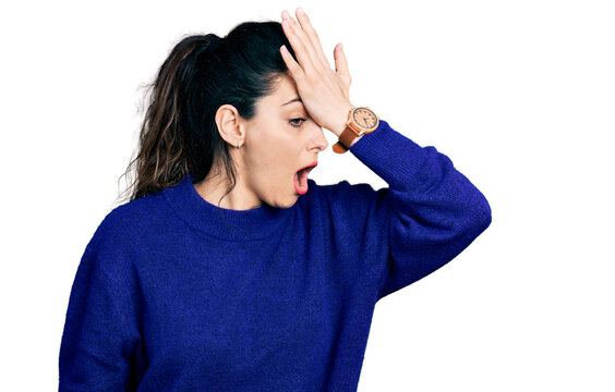 Young hispanic woman wearing casual clothes surprised with hand on head for mistake, remember error. forgot, bad memory concept.