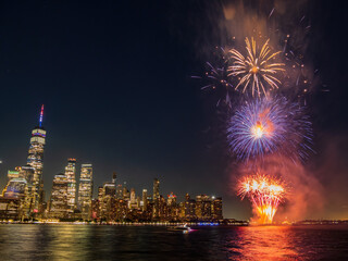 Fireworks celebration of July 4th with the famous Manhattan skyline