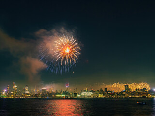 Fireworks celebration of July 4th with the famous Manhattan skyline