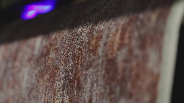 Industrial printer making new wallpaper sample. Modern wallpaper factory. Wallpaper production. One of step creation new wallpaper. Closeup