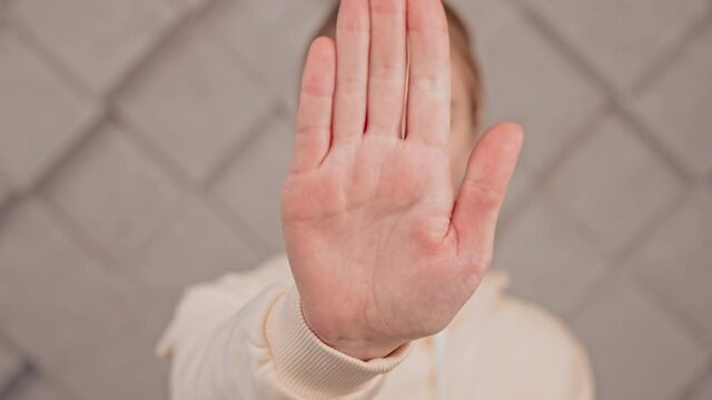 women's rights concept hand gesture stop saying no violence and discrimination psychological abuse slow motion