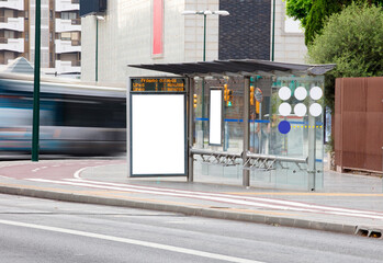 Billboard  in the city center , with bus in motion