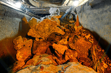 Mine cart filled with ore and stones