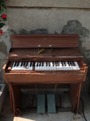 the old organ near the wall design for retro and vintage decoration concept