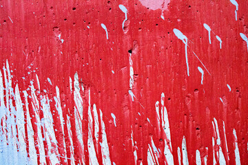 Red blood on the wall. Dirty concrete wall.