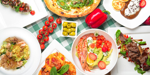 Italian cuisine concept top view Italian dishes. Summer strawberry menu.