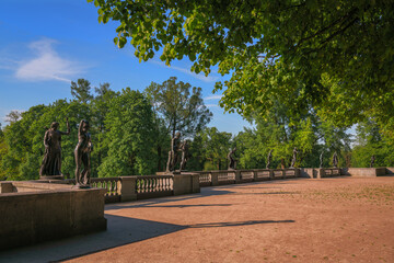 View of the granite terrace with statues in the Catherine Park in Tsarskoye Selo on a sunny spring...