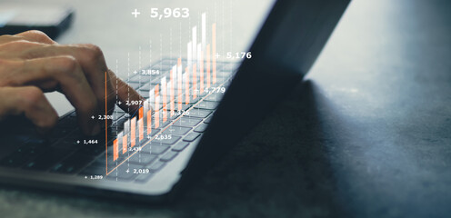 Laptop or computer with chart. Investment in business and financial