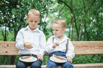 boys eats a birthday cake 