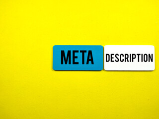 Business concept.Text META DESCRIPTION on color board on a yellow background.