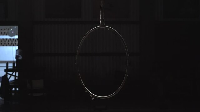 Circus Ring Hanging In Dark Theater Stage. Circo de los Ninos In San Pancho, Mexico. close up