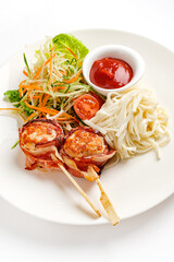 meatballs with noodle and salad